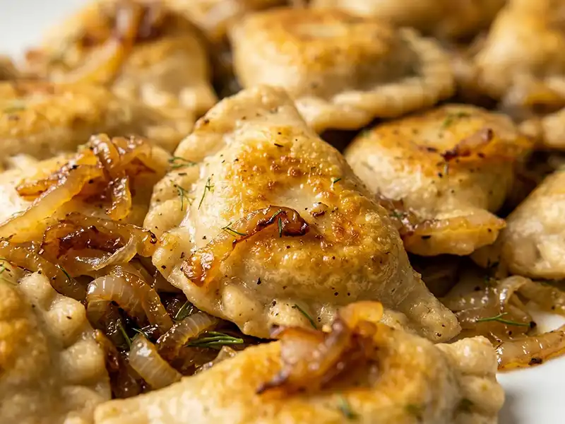 Hand-folded pan-fried pierogi with caramelized onion at Restaurant Relax, Greenpoint