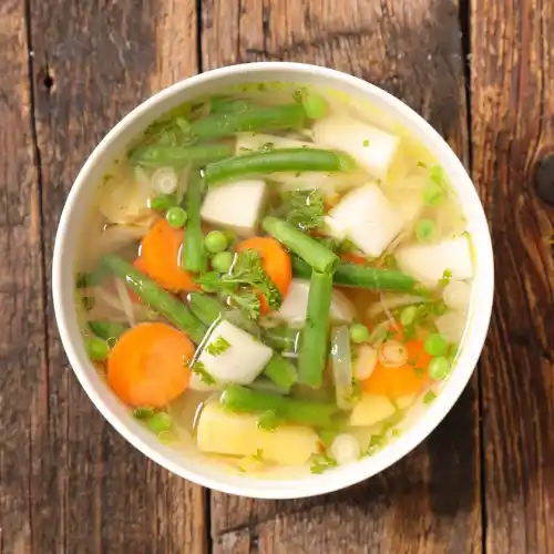 Traditional Polish vegetable soup, zupa jarzynowa, with green beans, peas, carrots and potatoes at Relax in Greenpoint